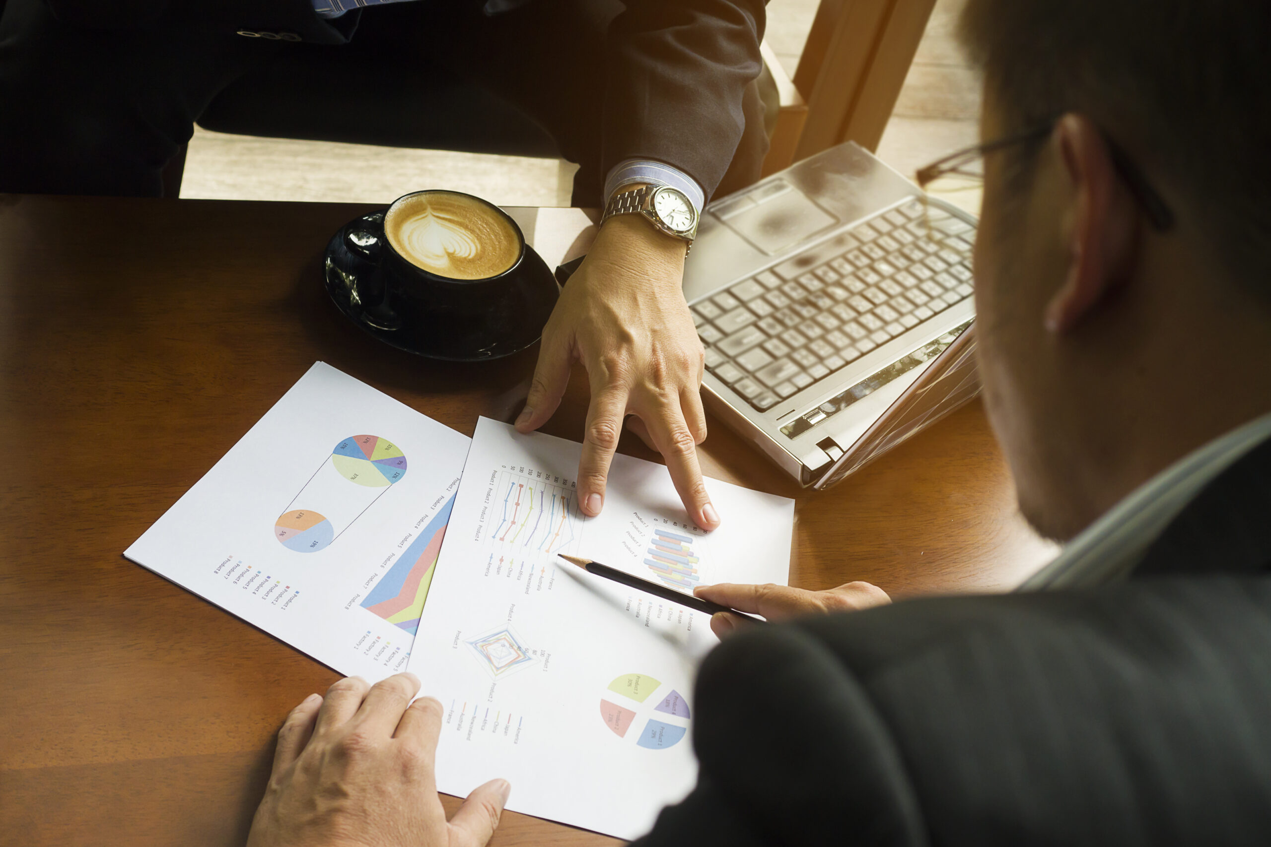 Executive reviewing financial metrics and AI governance deployment timeline